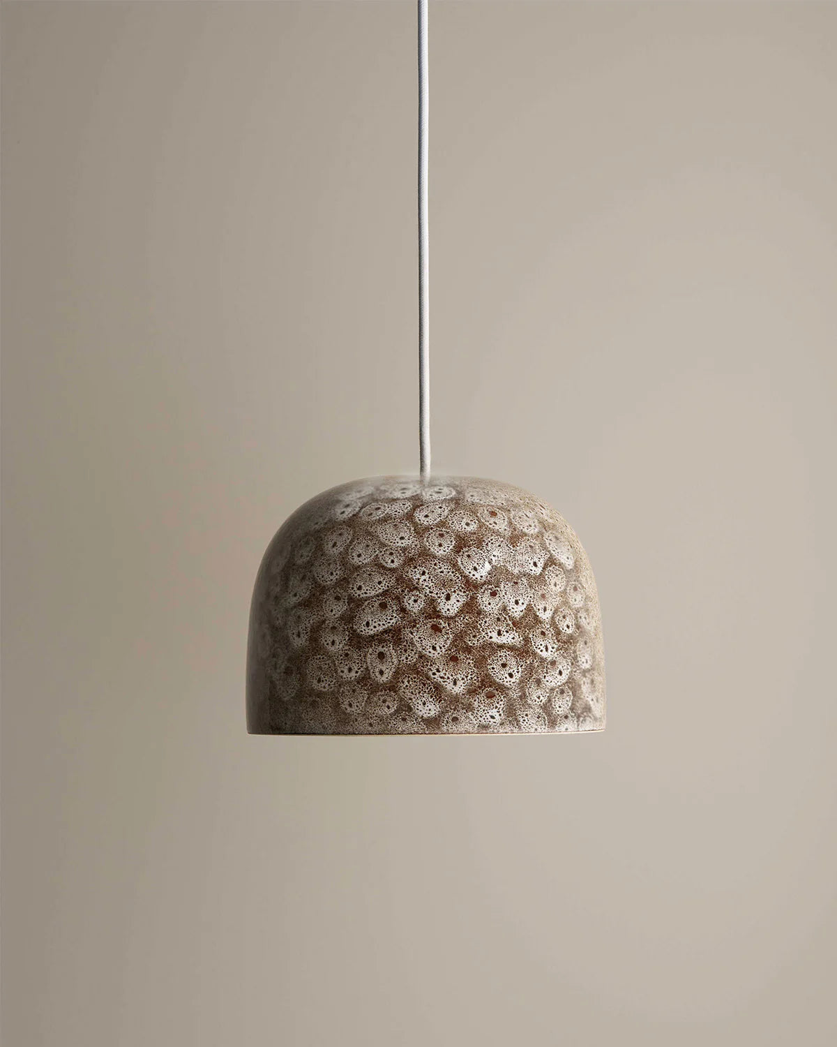 Cast Bell Pendant by Robert Gordon