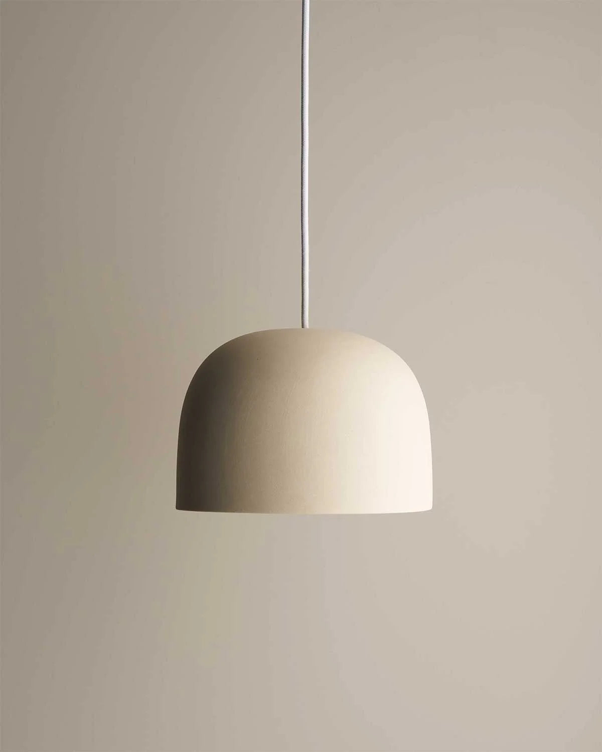 Cast Bell Pendant by Robert Gordon