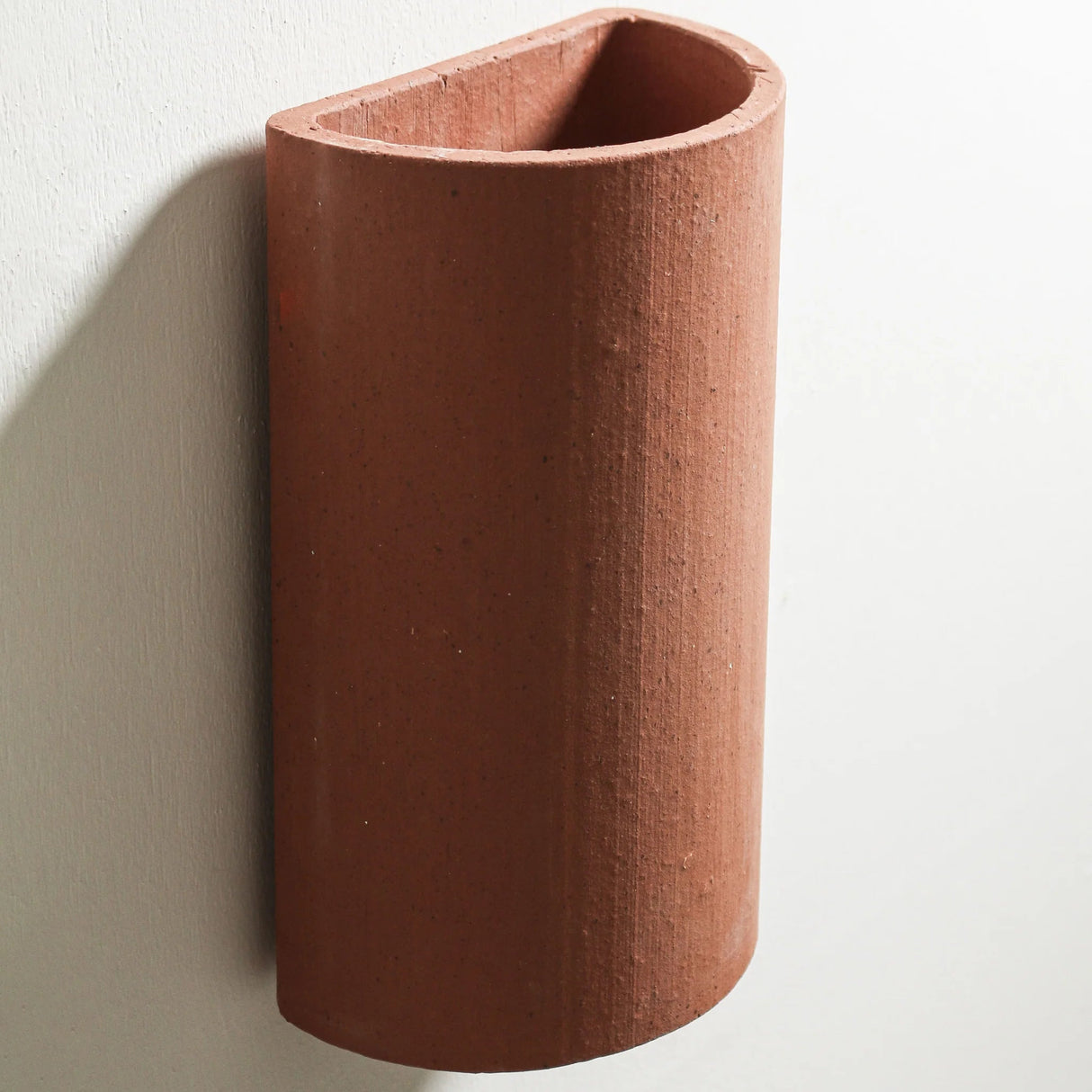 Curve Wall Light in Terracotta by Robert Gordon